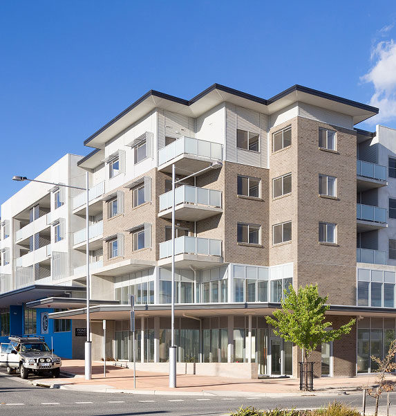 Pioneer minimalist apartment building with brick facade in Canberra