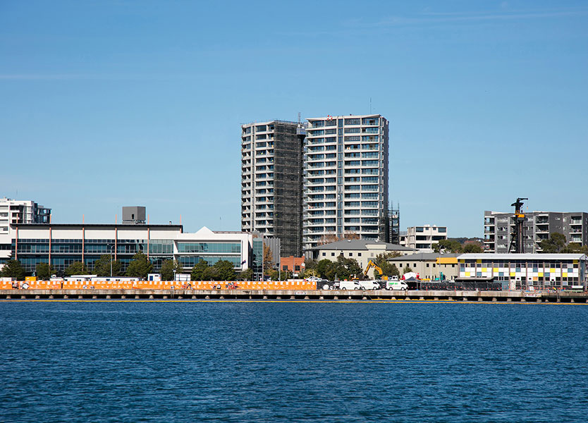 Verve high-rise residential apartments with podium park in Newcastle NSW contemporary landmark architecture