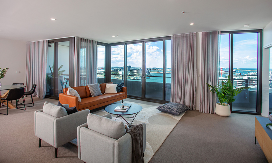 Landscaped podium level at Verve with garden residences above the street