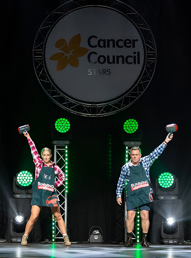 Participants performing on stage at Cancer Council Stars fundraising dance event