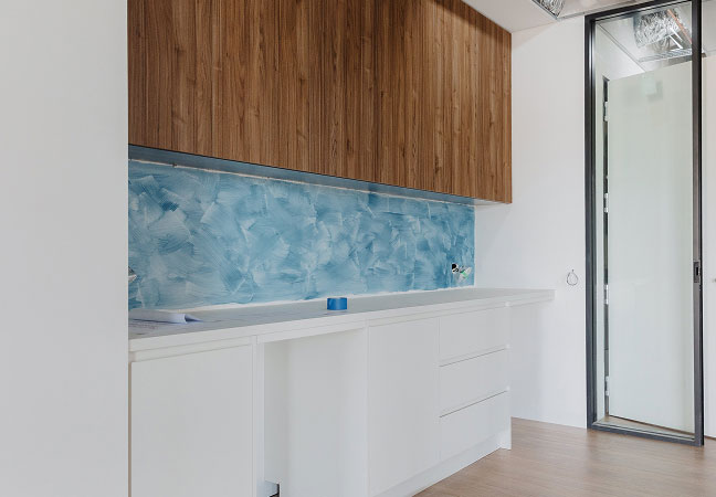 Newly built interior space within the Yowani Country Golf Clubhouse, including bar and kitchen joinery installation