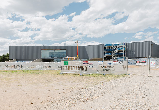 Exterior of the future Yowani Country Golf Clubhouse showing new roof, glass façade and completed structural framework