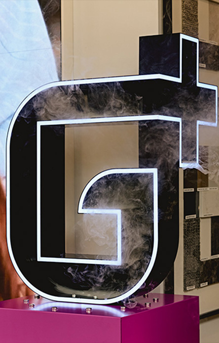 G+ illuminated logo display at the Giralang launch event