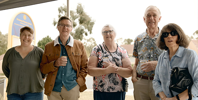 Attendees posing together at the Giralang launch event