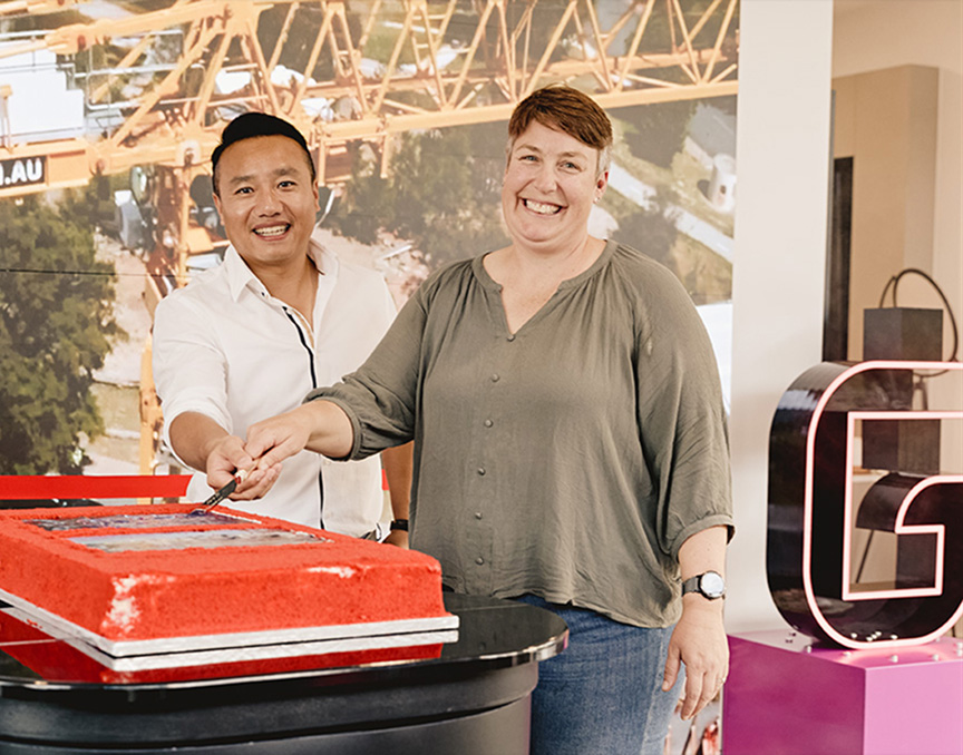 Cake cutting ceremony at the Giralang project launch
