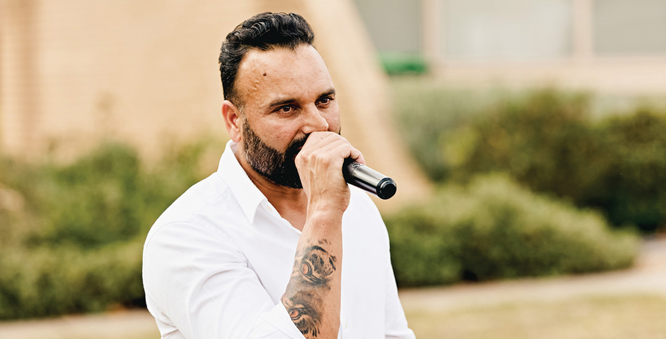 Kenneth Kong speaking at the Giralang project launch