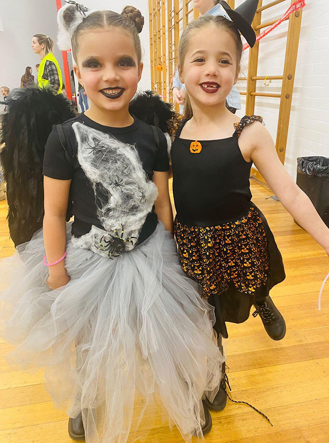 Children dressed in Halloween costumes at Giralang school disco