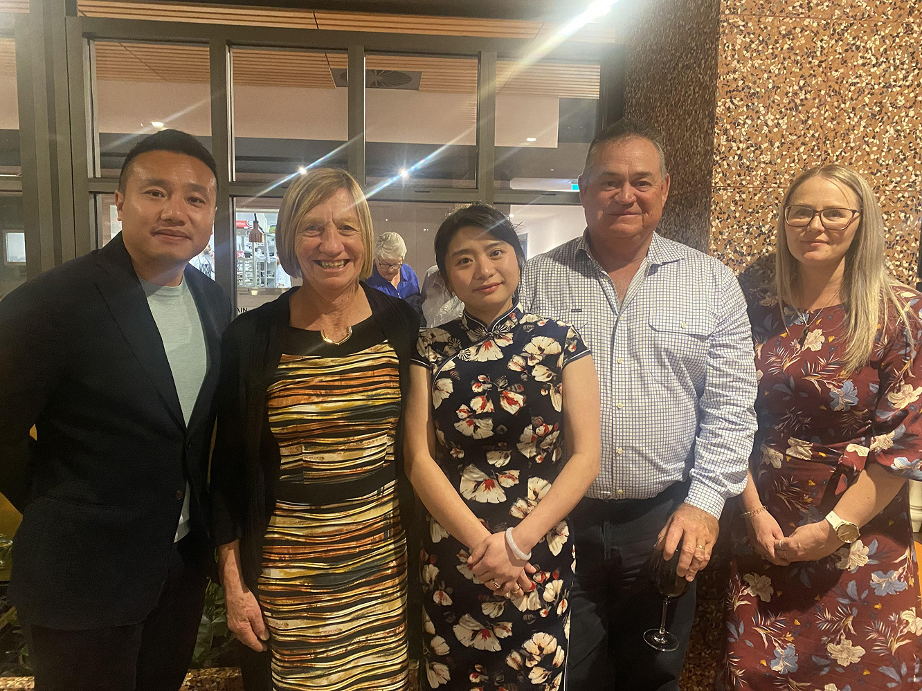 TP Dynamics representatives attending the HOME fundraiser with community members