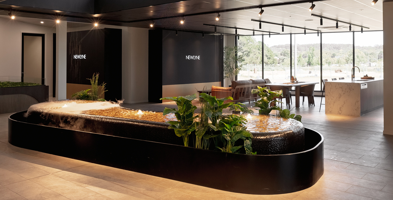 Water feature and lounge inside the Newlyne Experience Centre by TP Dynamics