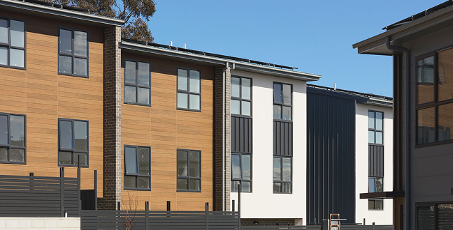 Modern townhouse exteriors at On the Rise development
