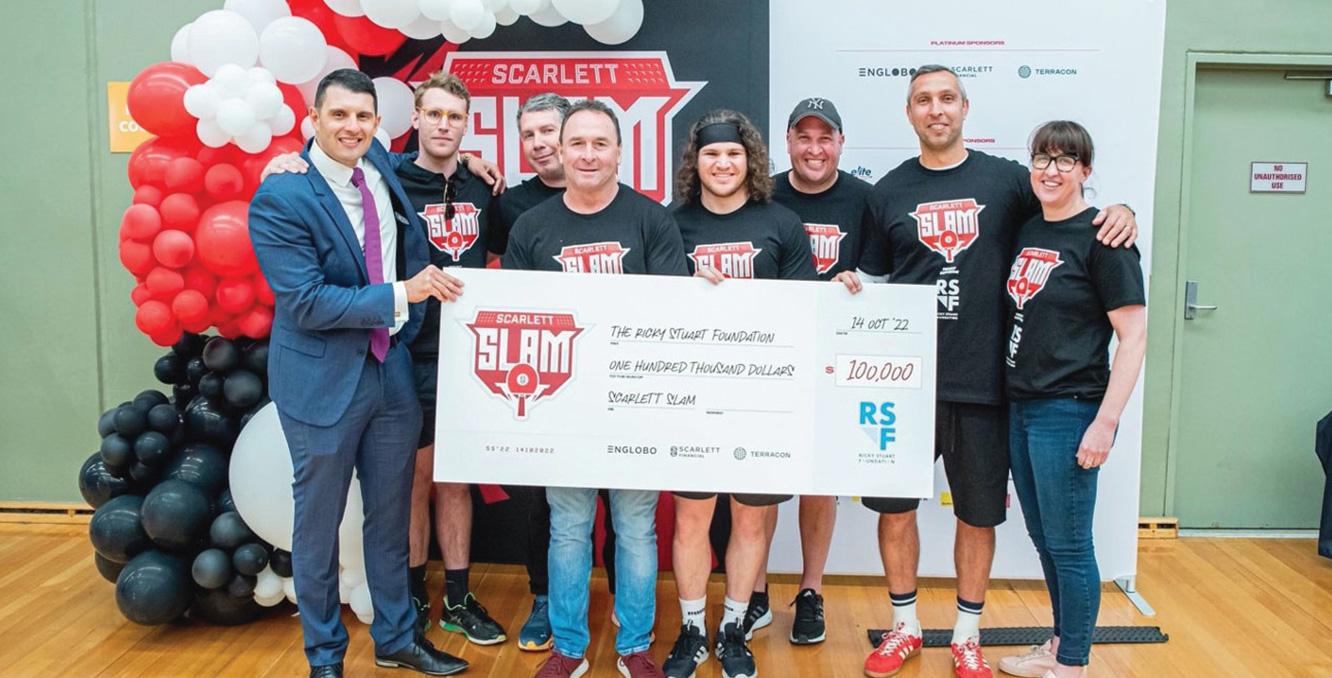 Scarlett Slam participants presenting a $100,000 cheque to the Ricky Stuart Foundation