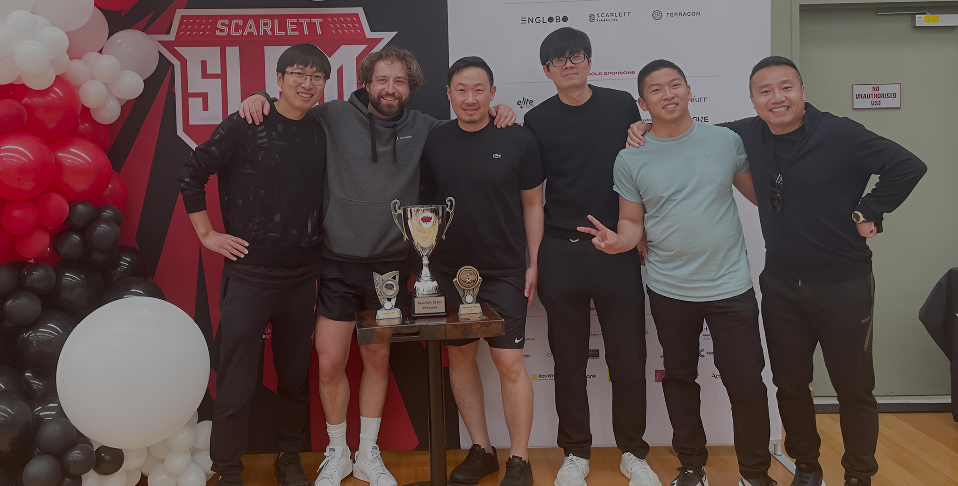 TP Dynamics team celebrating at Scarlett Slam with table tennis trophies