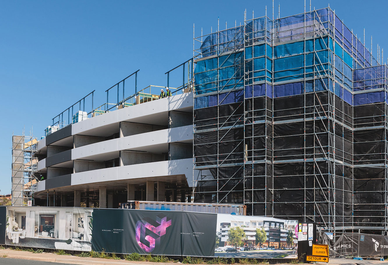 Architectural render of mixed-use retail and residential spaces