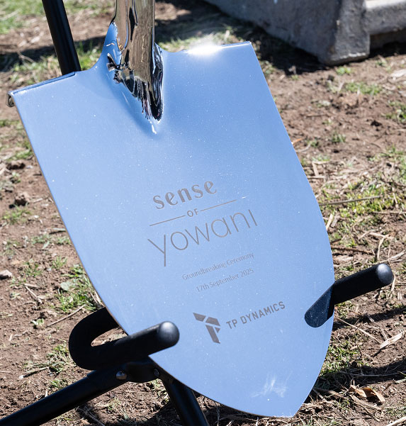 Ceremonial shovel breaking ground to mark the commencement of construction at Sense of Yowani