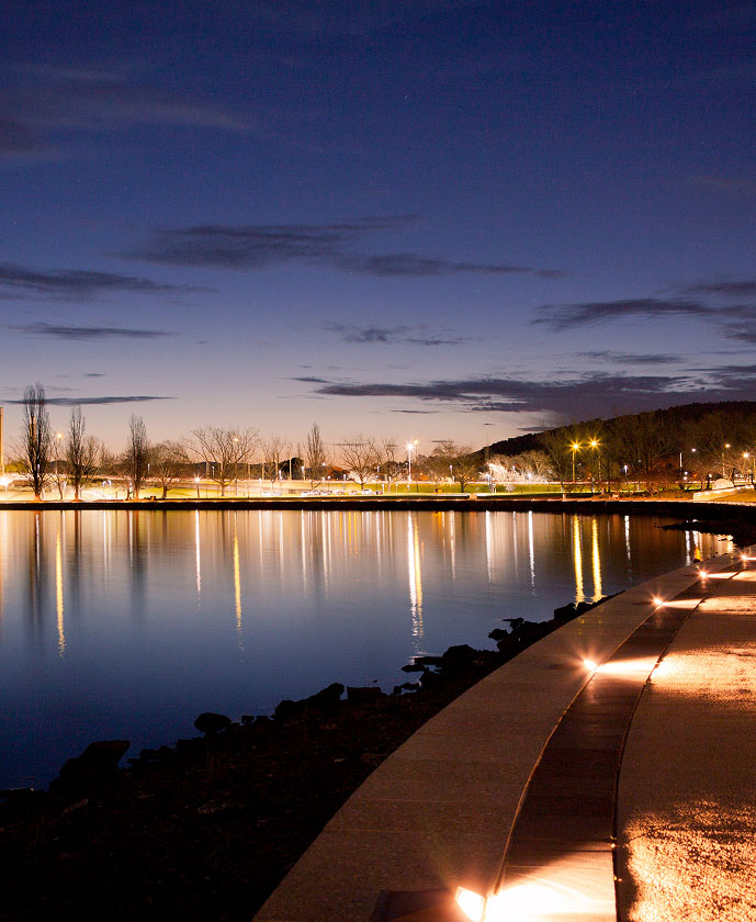 Lake Burley Griffin at dusk reflecting Canberra’s vibrant urban vision by TP Dynamics