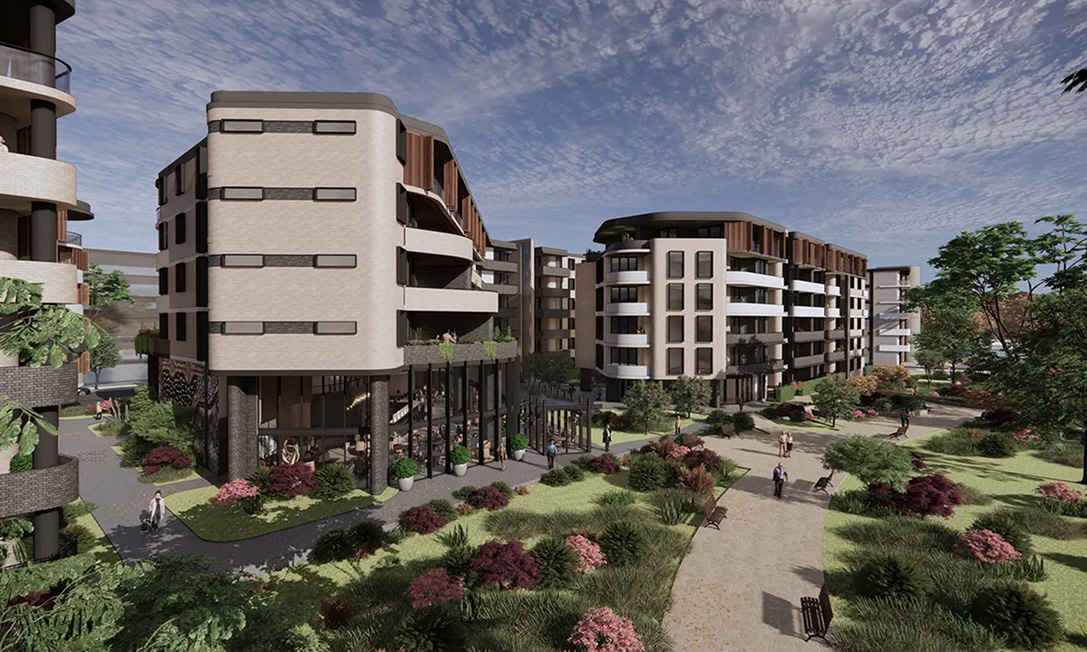 SENSE by TP Dynamics – retirement apartments facade at dusk with curved balconies and stone detailing