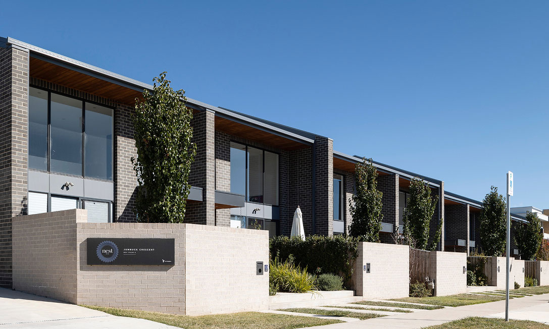 Nest I townhouses in Lawson, Canberra with cube-like balcony forms and a clean contemporary façade