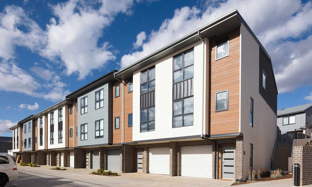 RISE by TP Dynamics in Bruce, Canberra — contemporary townhouse facade with landscaped walkway